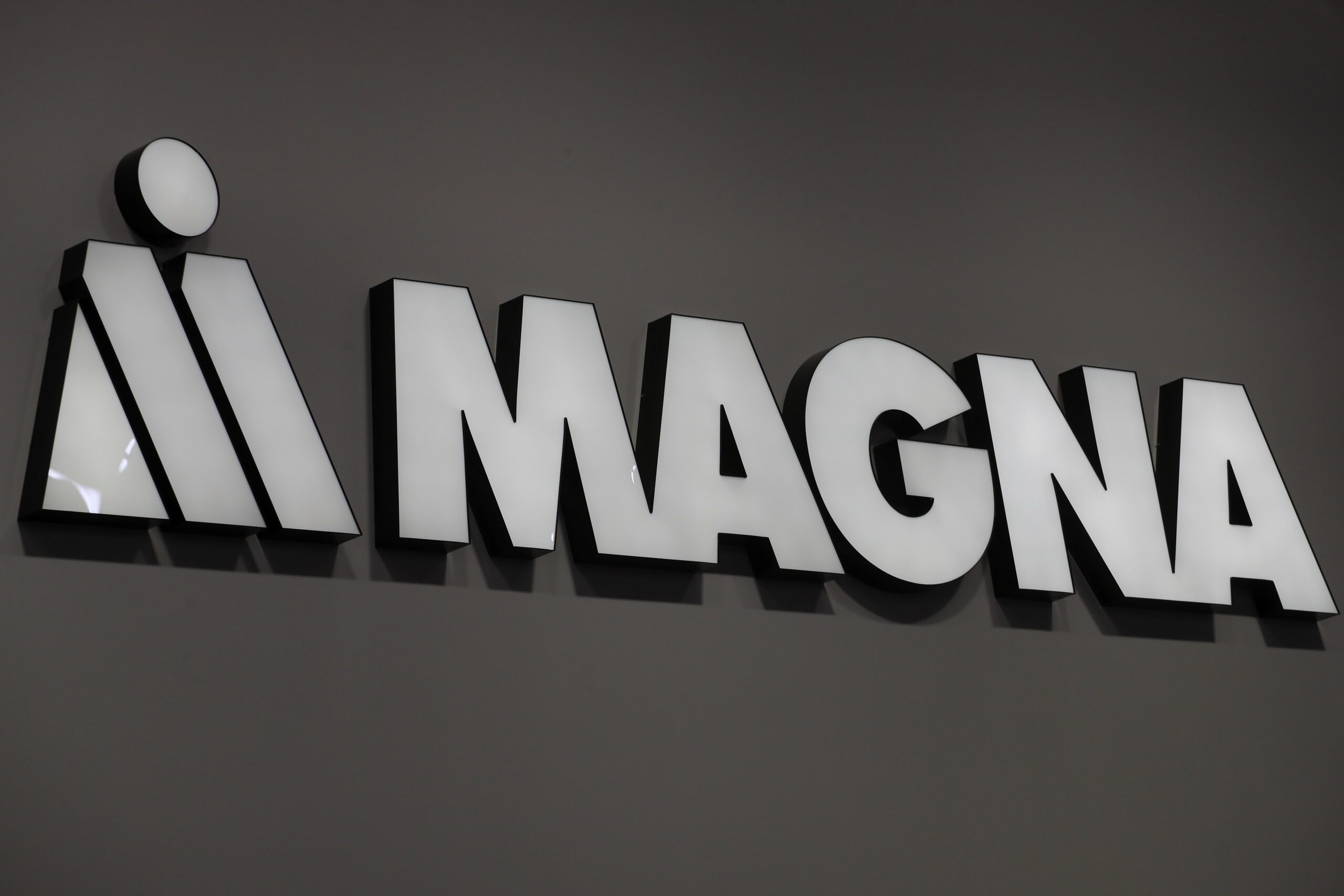 Magna logo photo taken during Munich Auto Show, IAA Mobility 2021 in Munich, Germany, September 8, 2021. REUTERS/Wolfgang Rattay
