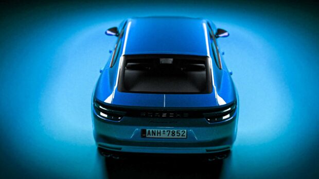 Blue Porsche rendering, aerial rear view